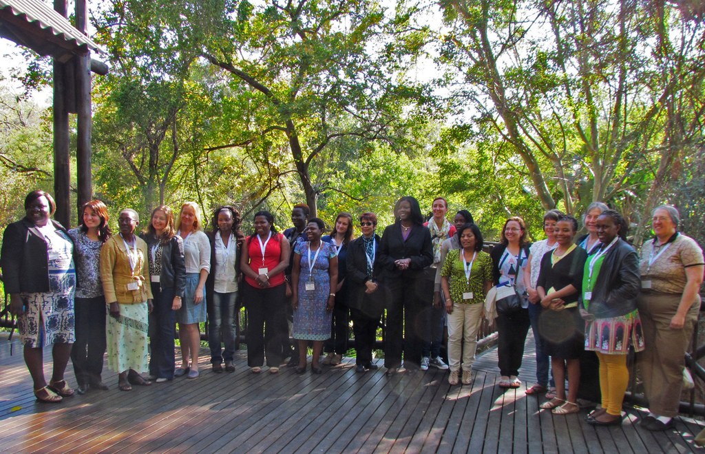 A group of women scientists who participated in the Common Bean Workshop with USDA Director of the Office of the Chief Scientist, Dr. Chavonda Jacobs-Young (center). 
