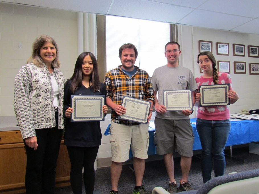 Dr. Carolee Bull (L) presenting the Plant Pathology Graduate Studies Enhancement Award certificate to (L-R): Yueying Chen, Christopher Smyth, Rob Harvey, and Kristi Fenstermacher. Not pictured: Anita Behari.