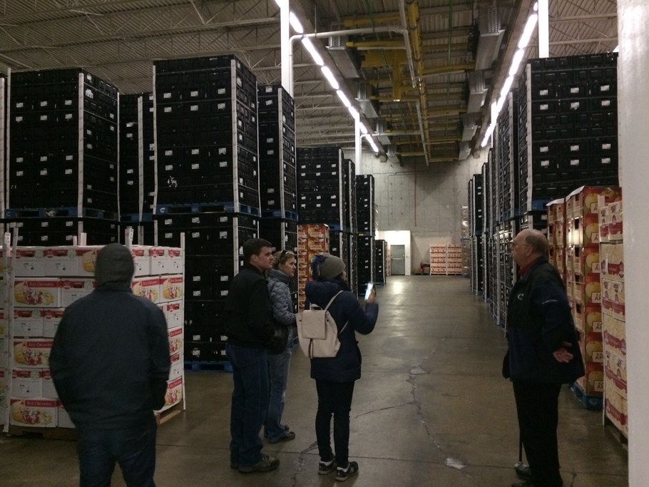 Rice Fruit warehouse for sorted/packed/ready-to-ship fruit. (L-R) Justin Shih, Phillip Martin, Kari Peter, Emma Rosenthal, Lee Rosenthal | Image: Laura del Sol Bautista Jalón, Penn State University
